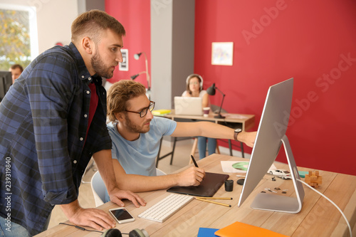 IT specialists working in o...