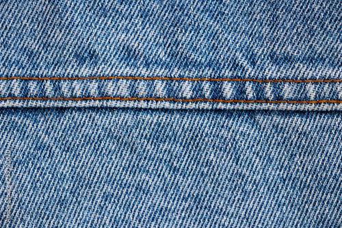 Jeans texture. Double stitching on denim. Close-up.