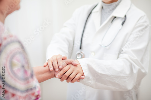 Doctor Asian woman, medical professional touch contact for gesture up confidence Let the patient .