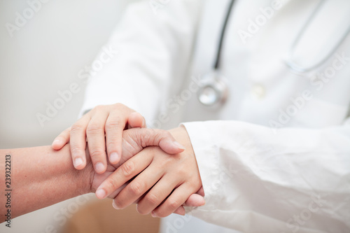 Doctor Asian woman, medical professional touch contact for gesture up confidence Let the patient .