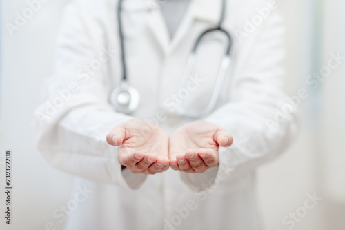 Empty hands of the Doctor , medical professional handed holding virtual object to paste text or item product . healthcare and advertisement concept, copy space