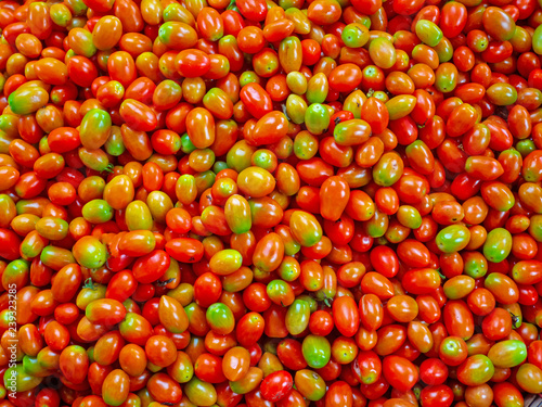 Fresh organic small tomatoes, close up of tomatoes - Image