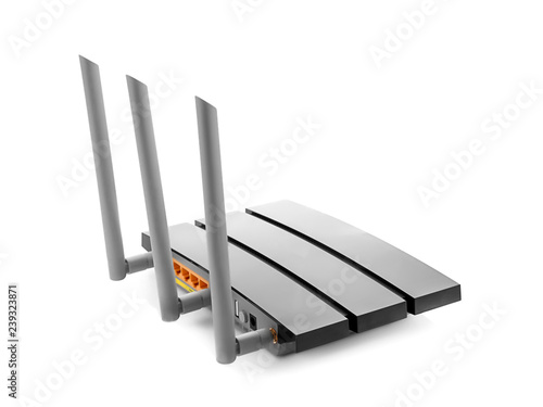 Modern wi-fi router on white background photo