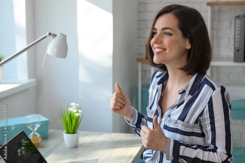Happy businesswoman working in office Happy businesswoman working in office
