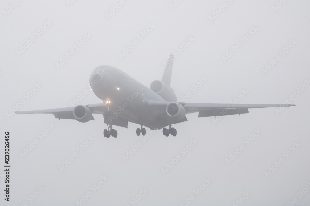 Airplane in the fog Airplane in the fog