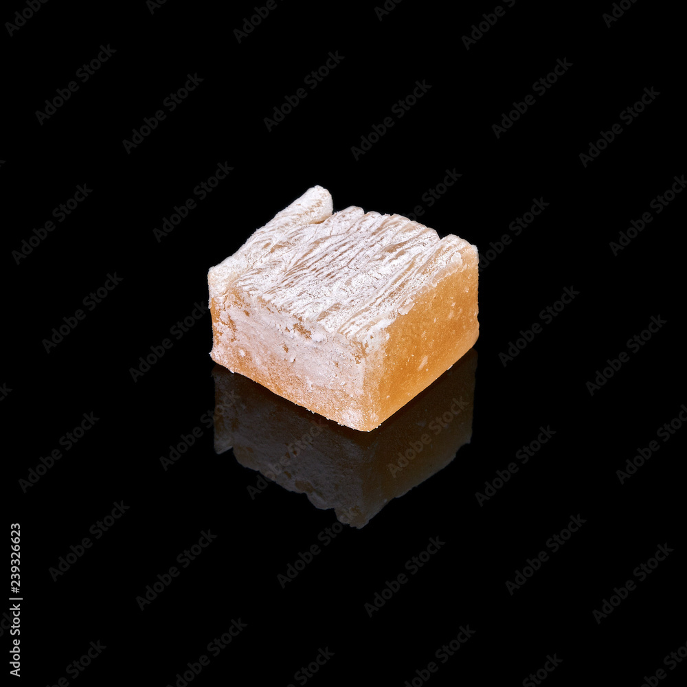 Turkish sweet delights rahat-lokum isolated on black background Turkish sweet delights rahat-lokum isolated on black background