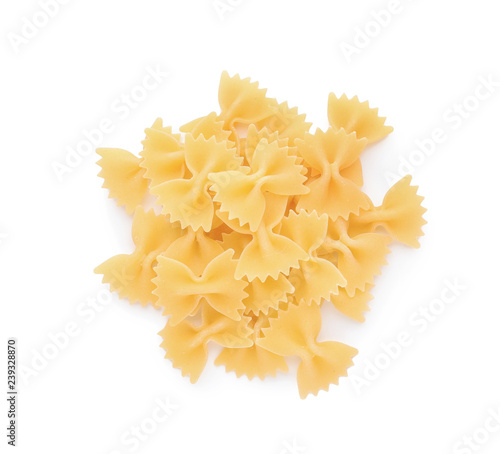 Uncooked farfalle pasta on white background