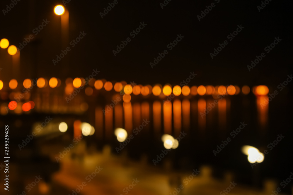 Blurred view of illuminated city at night