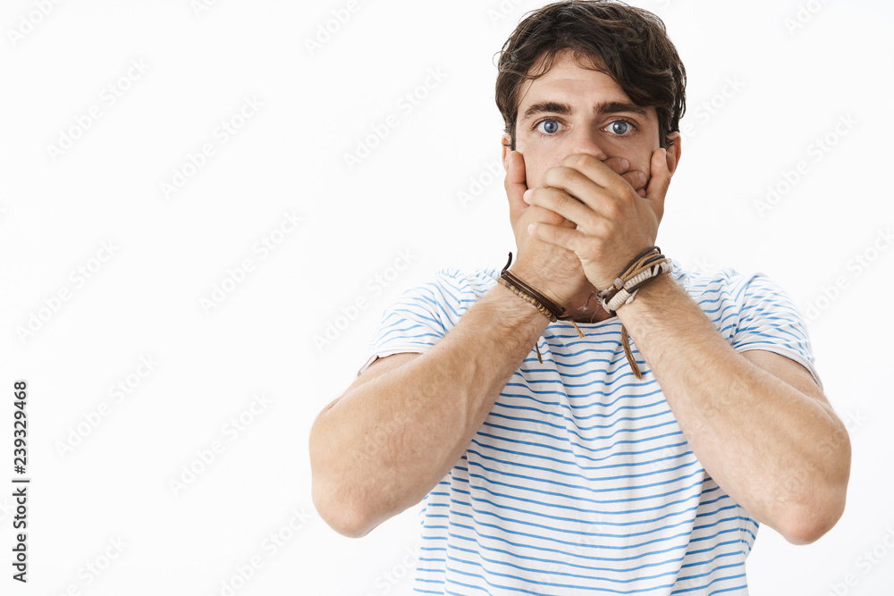 Waist-up shot of shocked panicking handsome insecure guy feeling anxious,  overthinking, acting immature covering mouth with palms in shock and  amazement being worried and concered over recent news Stock-Foto | Adobe  Stock