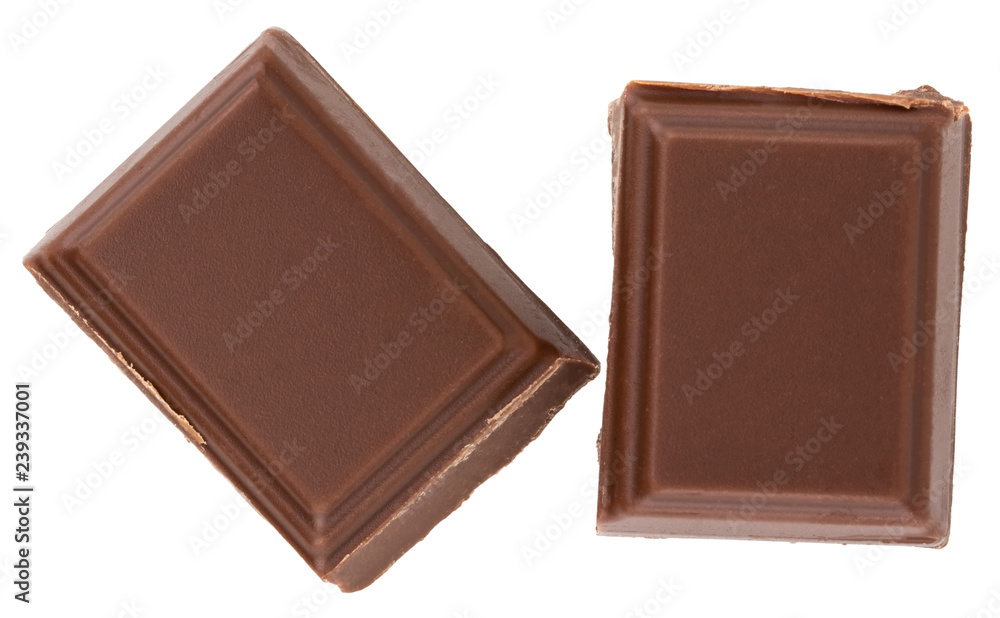 Milk chocolate pieces isolated on white background Milk chocolate pieces isolated on white background