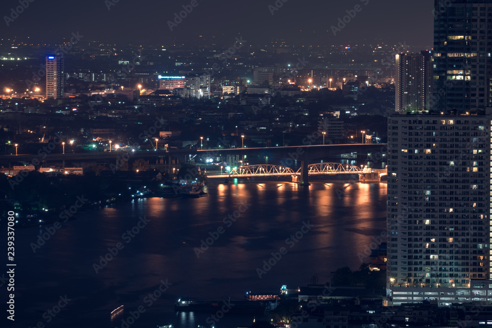 Chao phraya river in Business area of Bangkok at night