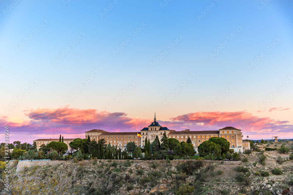 A palace in a colorful sunset at Toledo's city in Spain