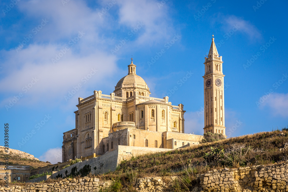 Gozo, Malta - May 22nd 2018 - A catholic church in a blue sky day in Gozo island in the north of Malta