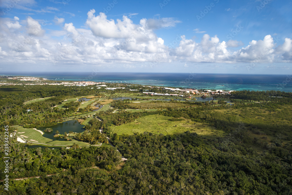 Obraz premium Coastal zone of the Dominican Republic. View from the cockpit of the helicopter.