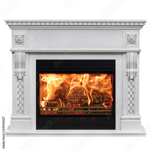 Burning classic fireplace of white marble. Isolated on white