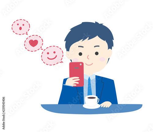 スマートフォンでメッセージを送る男性