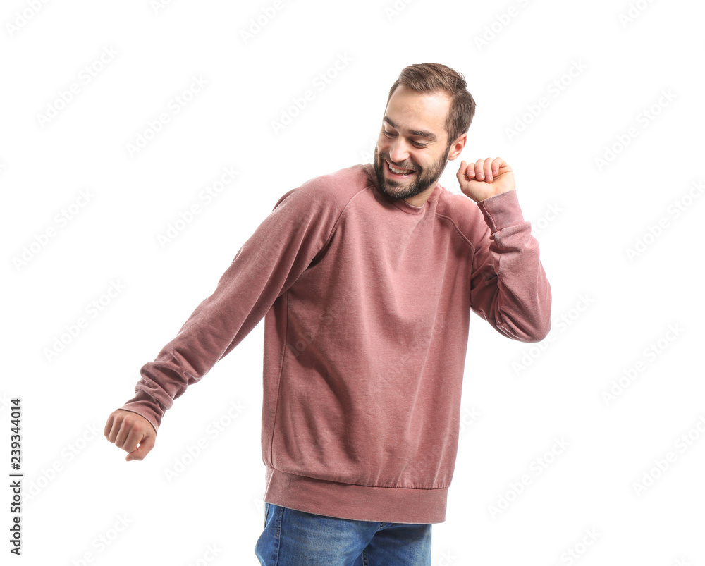 Handsome young man dancing on white background Handsome young man dancing on white background
