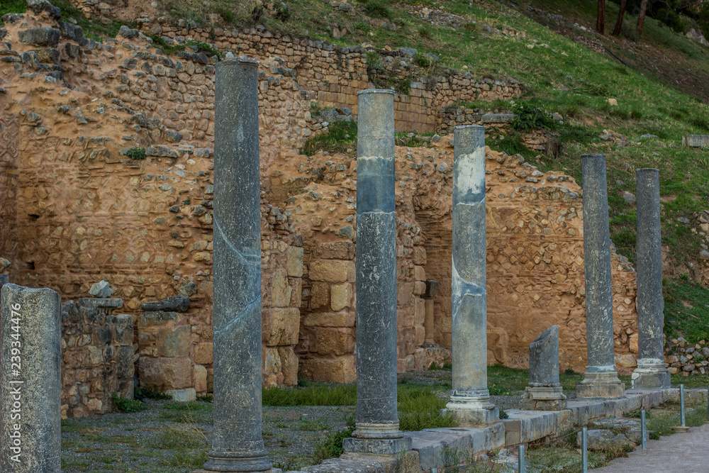 antique columns ruins from ancient Greece architecture destroyed city sightseeing and tourist world heritage site concept