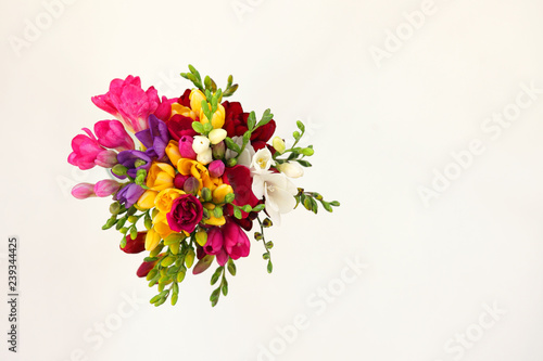 Bouquet of colorful flowers on white background for spring and summer holidays and post card. Top view.