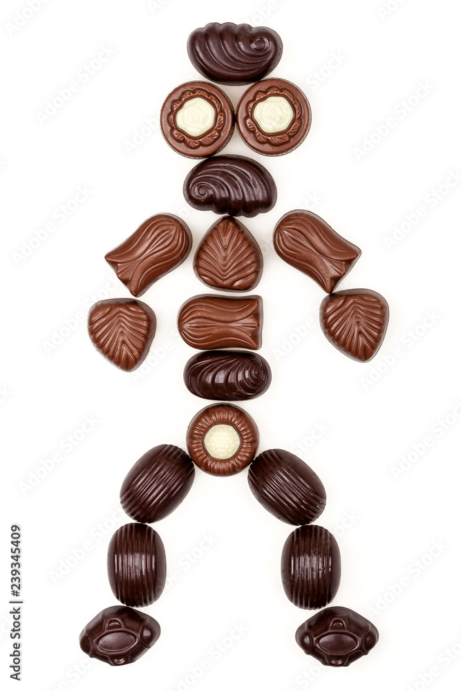 Little human figure made of chocolate candies Little human figure made of chocolate candies