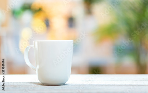 Coffee cup on a bright interior room background
