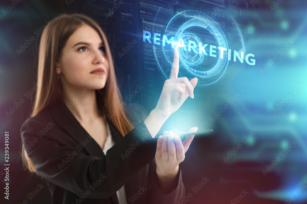The concept of business, technology, the Internet and the network. A young entrepreneur working on a virtual screen of the future and sees the inscription: Remarketing The concept of business, technology, the Internet and the network. A young entrepreneur working on a virtual screen of the future and sees the inscription: Remarketing