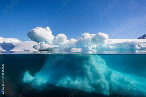 Above and below view of glacial ice near Port Lockroy, Antarctica, Polar Regions photo