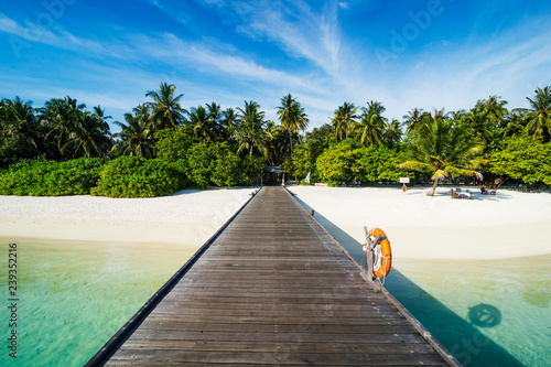 Long pier leading to a small island over turquoise water, Sun Island Resort, Nalaguraidhoo island, Ari atoll, Maldives