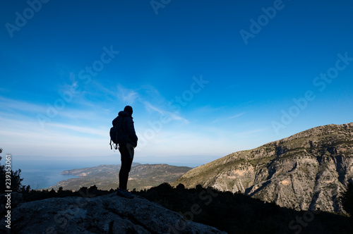 A woman hiking in the Taygetos mountains on the Mani peninsula in the Peloponnese in Greece
