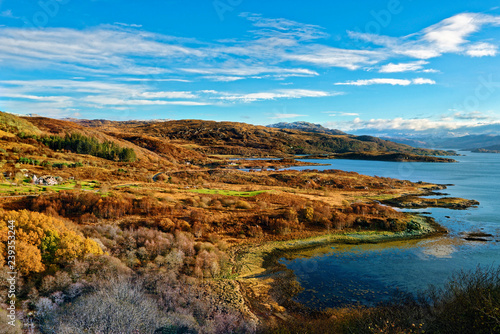 Sweeping autumn view of the tree covered hills and valley along the banks of Loch Sunart in the Ardnamurchan Peninsula