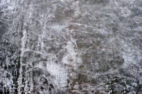 Concrete wall background with pattern of scuffs and streaks