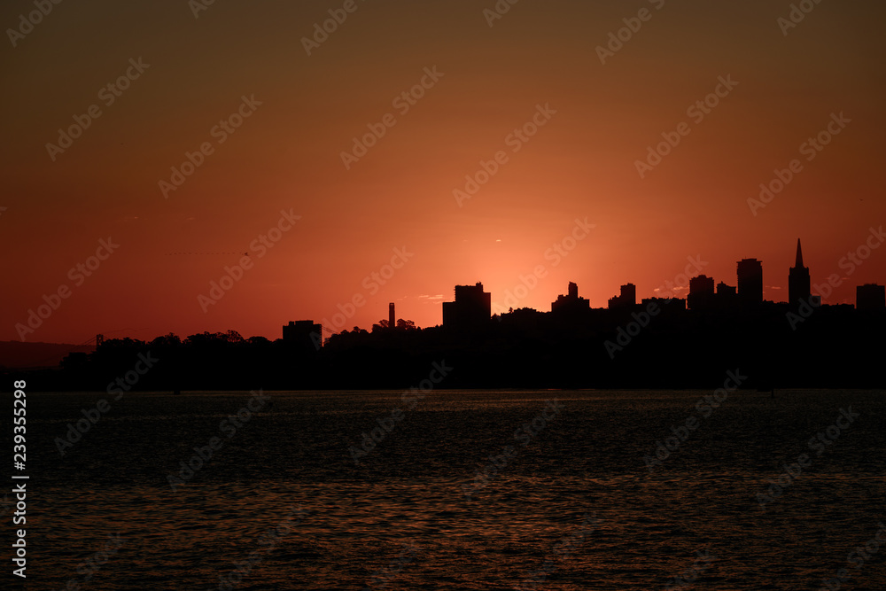 Sun rising over downtown San Francisco from the Torpedo Wharf