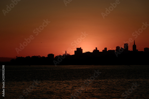 Sun rising over downtown San Francisco from the Torpedo Wharf © Esteban Martinena