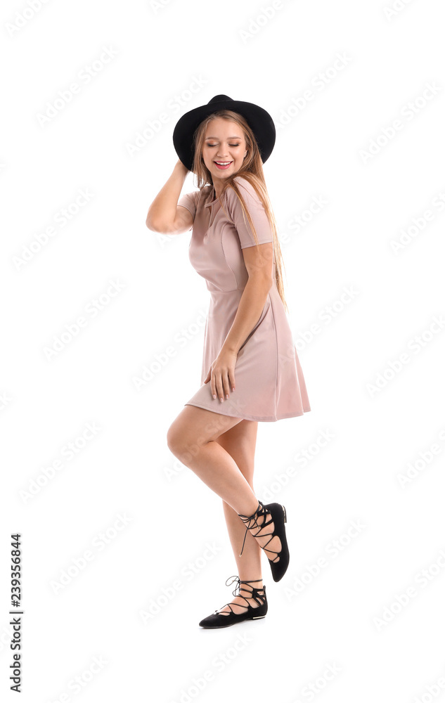 Beautiful young woman dancing on white background Beautiful young woman dancing on white background