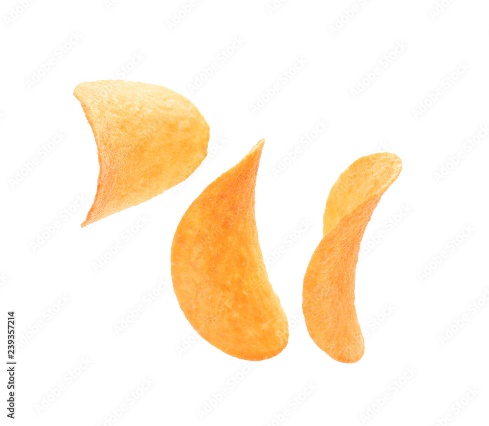 Tasty crispy potato chips on white background Tasty crispy potato chips on white background