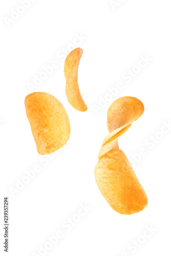 Tasty crispy potato chips on white background