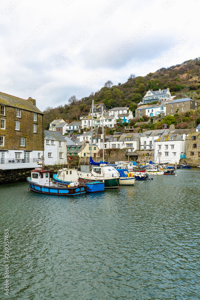 Fishing and Leisure boats moored in the historic harbour at Polperro, Cornwall.