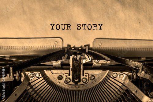 your story is printed on a sheet of paper on a vintage typewriter. writer, journalist.
