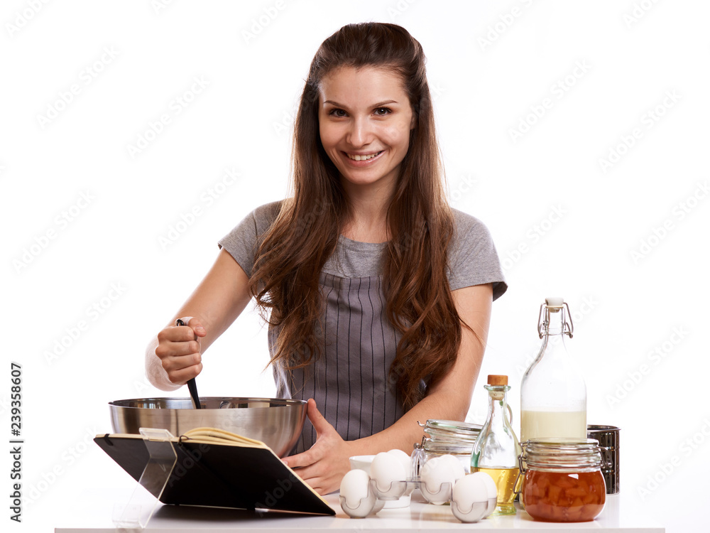 Portrait of beautiful chef home cook at home with dessert cupcakes homemade sweets Portrait of beautiful chef home cook at home with dessert cupcakes homemade sweets