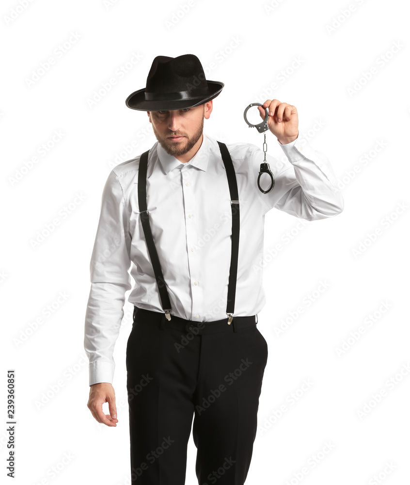 Detective with handcuffs on white background