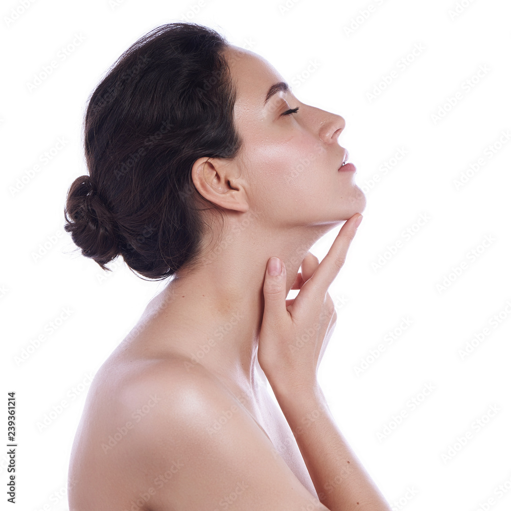 Beautiful face of young adult woman with clean fresh skin - isolated on white Beautiful face of young adult woman with clean fresh skin - isolated on white