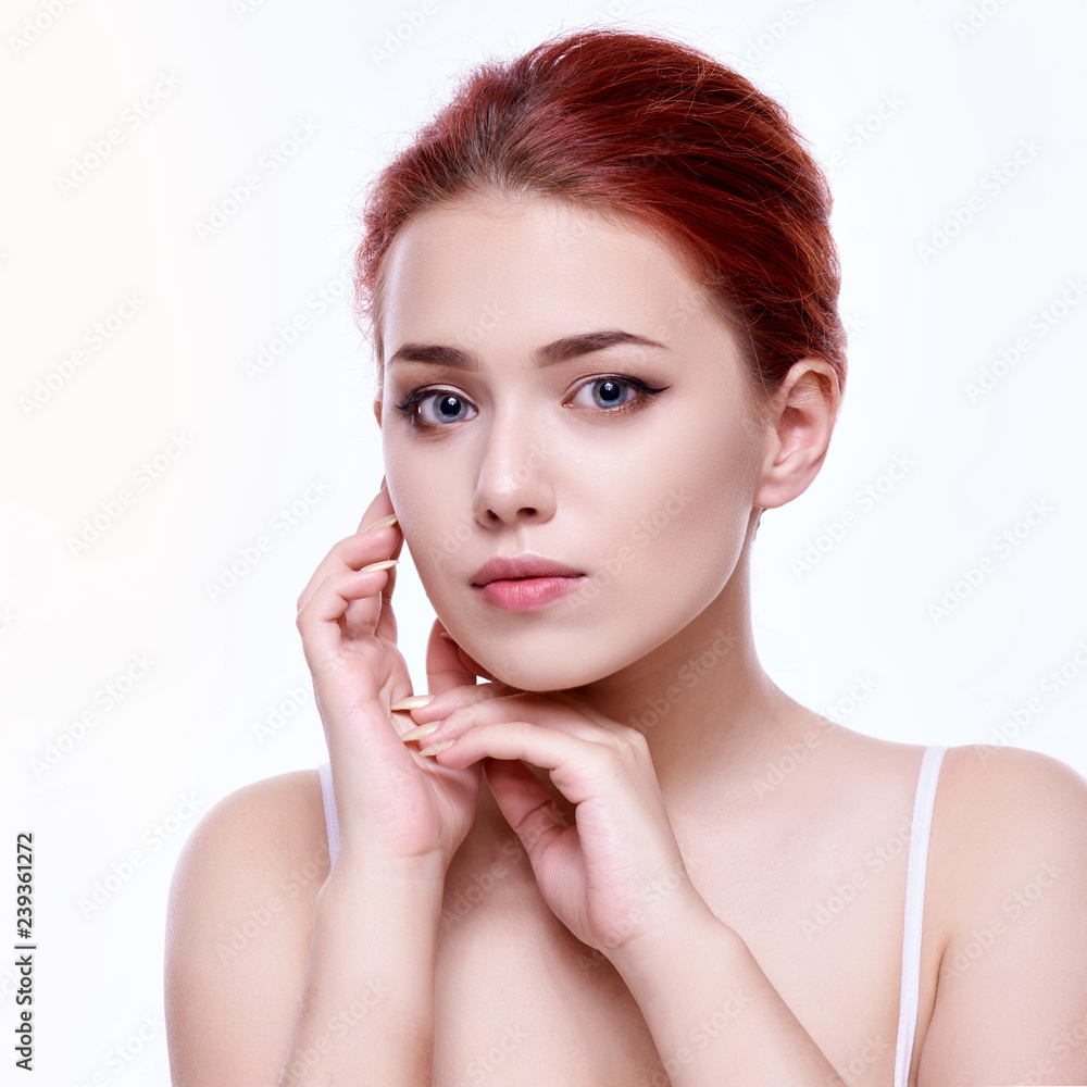Beautiful face of young adult woman with clean fresh skin - isolated on white Beautiful face of young adult woman with clean fresh skin - isolated on white