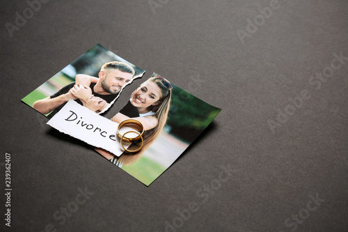 Torn photo of happy couple ...