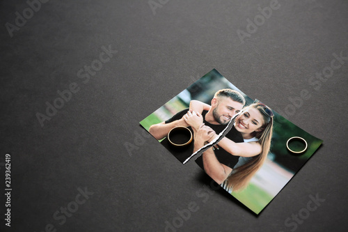 Torn photo of happy couple ...