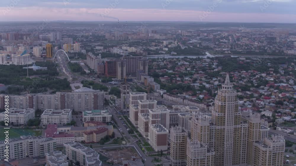 Astana, Kazakhstan - July 5, 2018: The Astana Triumph at sunset Astana, Kazakhstan - July 5, 2018: The Astana Triumph at sunset