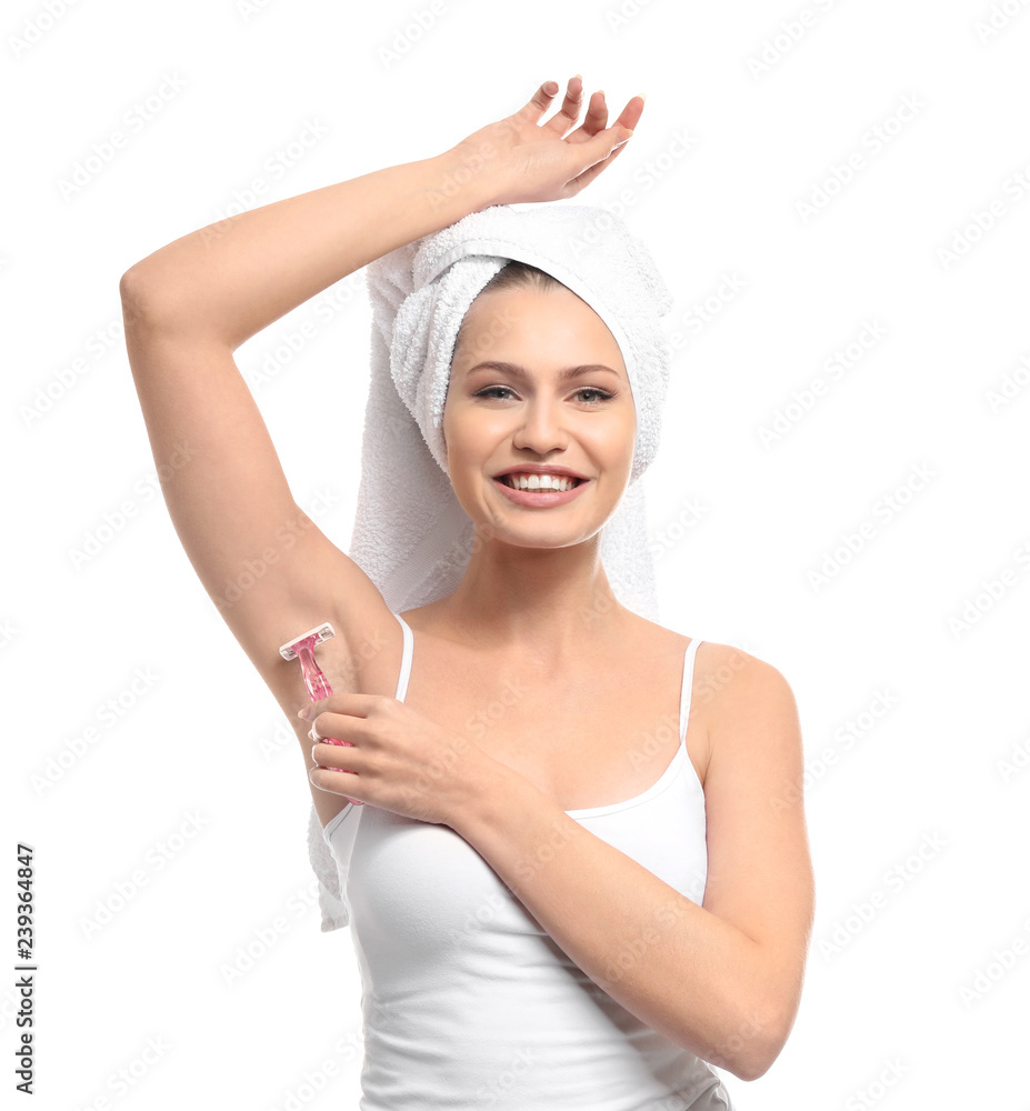 Beautiful young woman shaving armpits on white background Beautiful young woman shaving armpits on white background