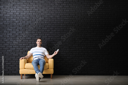 Young man with air conditio...