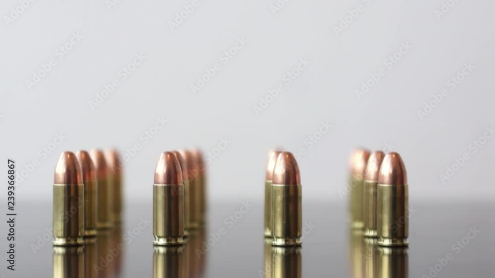 9mm Bullets in straight lines Steady shot of 9mm Bullets in straight lines 9mm Bullets in straight lines Steady shot of 9mm Bullets in straight lines