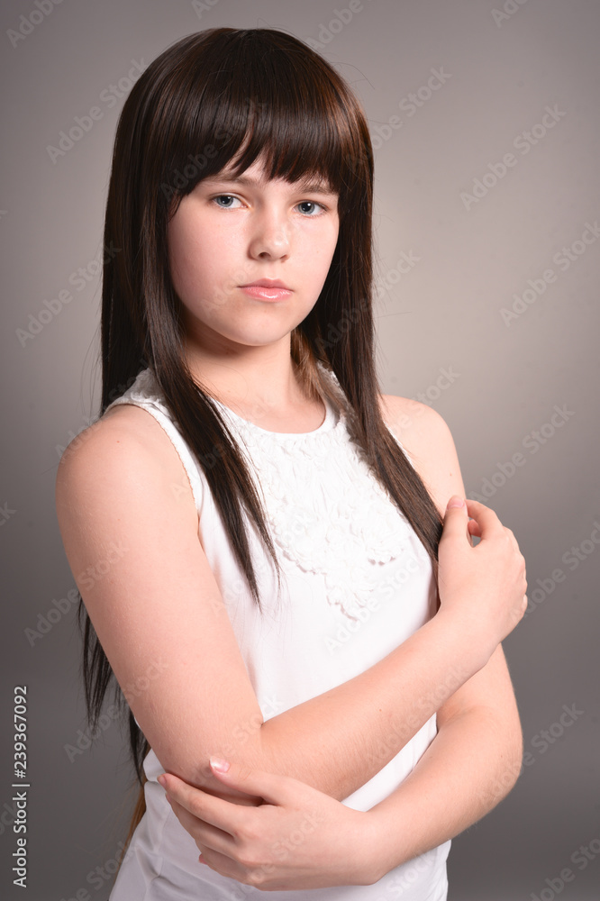 Close up portrait of cute girl with dark hair posing Close up portrait of cute girl with dark hair posing