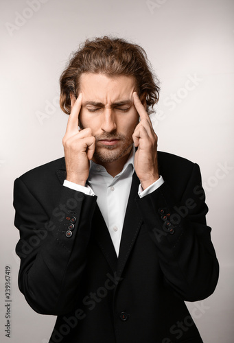 Stressed Man with Headache